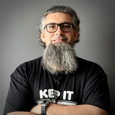 Portrait of Nezih Tinas, technical interviewer and advisor to The Qualidex